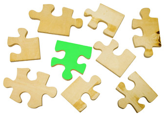 Wooden puzzle on white