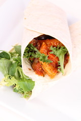 Tortilla wraps with meat and vegetables