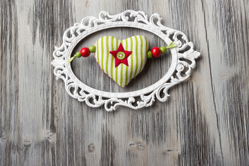 Handmade  heart on wooden background