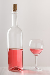 Rose wine in bottle and wine glass