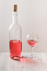 Rose wine in bottle and wine glass