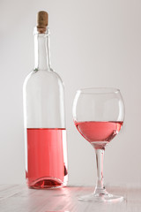 Rose wine in bottle and wine glass