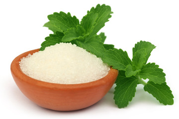 Stevia with sugar on a brown bowl