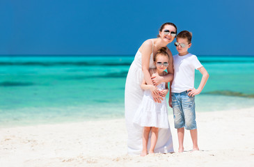 Mother and kids at tropical beach