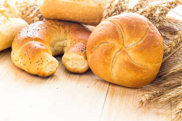 Various bakery products wooden background