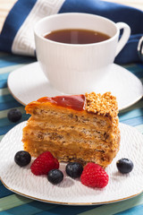 Cake with black tea and fresh berries