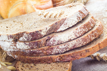 Loaf of bread sliced ​​with crispy rolls
