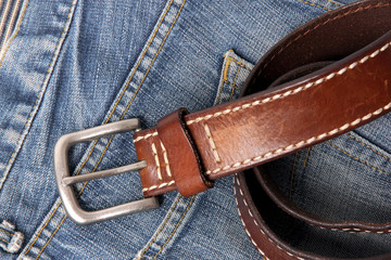 Blue jeans with old brown belt horizontal