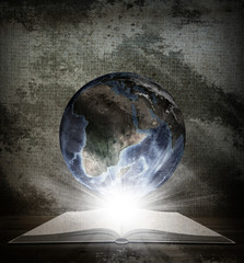 Over an open book is planet earth