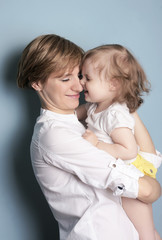 mother holds a daughter