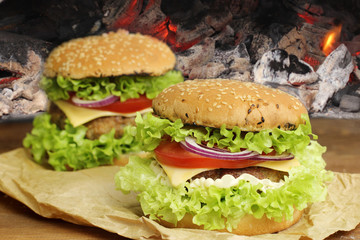burger with grilled beef, cheese and vegetables