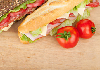Fresh sandwiches with meat and vegetables and tomatoes