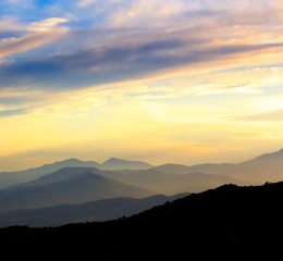 sunset on the mountains silhouette landscape