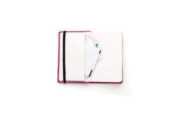 blank open diary with side pocket and slips of paper, isolated o