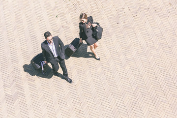 Business People Walking with Trolley Bag, Aerial View