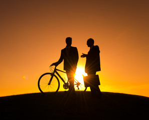 Fototapeta premium Businessmen on the Way During Sunset