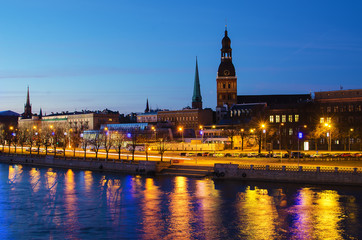 Fototapeta na wymiar Riga (Latvia) at night. The view from Daugava river