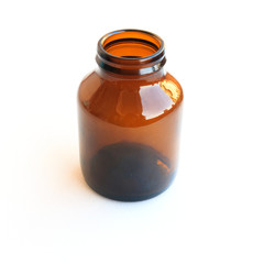 old brown glass medicine bottle isolated on white
