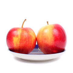 Bright apples on the plate