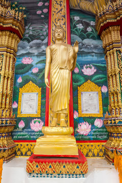 Standing statue of Buddha in Phuket, Thailand