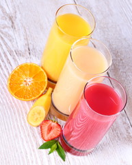 Fruity drinks juice from banana, tangerine, strawberry