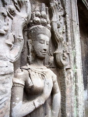 Fototapeta na wymiar Devata na Ta Prohm w Angkor - Siem Reap, Kambodża
