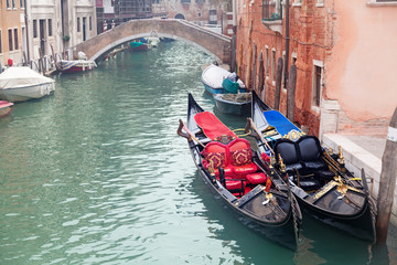 Fototapeta na wymiar Two gondola in Venice near pier