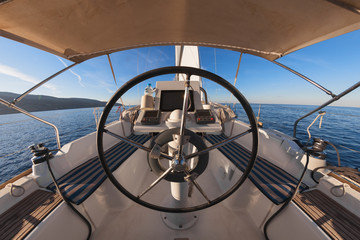 Inside the cockpit of sailing yacht - 64055489