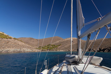 Fototapeta na wymiar Sailing boat wide angle view near greece island