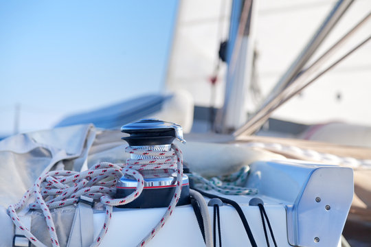 Winch with rope on sailing boat