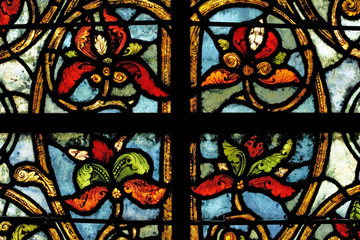 Stained glass windows in St. Denis cathedral, Paris, France