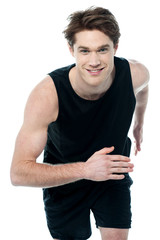 Smiling sportive man running