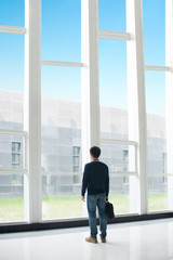 Fototapeta premium Man standing in the hall