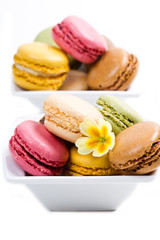 white bowl with colored macaroons