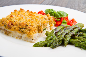 cod fish with crispy breadcrumbs and asparagus