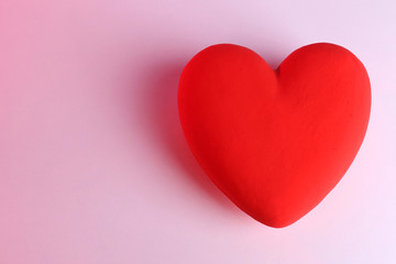 Decorative red heart, on color background