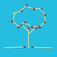 Retro Tree Made From Matches on Blue Background