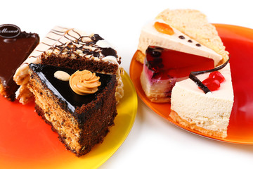 Assortment of pieces of cake, isolated on white © Africa Studio