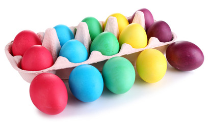 Colorful Easter eggs in tray isolated on white