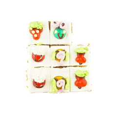Slice cake topping as fruit and animal isolated