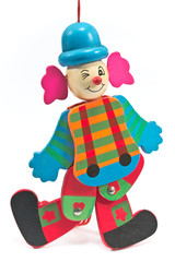 Mechanical clown toy on string isolated on white