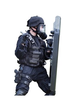 policeman in a gas mask and shield, isolated on white