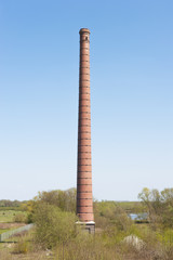 Chimney of old brick factory - 64072426