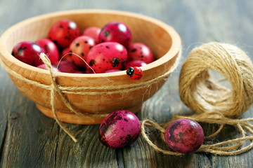 Easter eggs in wooden bowl.