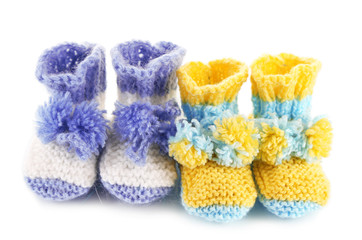 Fototapeta na wymiar Crocheted booties for baby, isolated on white