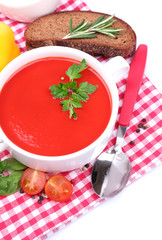 Tasty tomato soup and vegetables, isolated on white