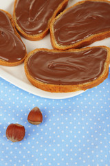 Bread with sweet chocolate hazelnut spread