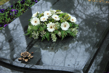 Funeral flowers on a tomb