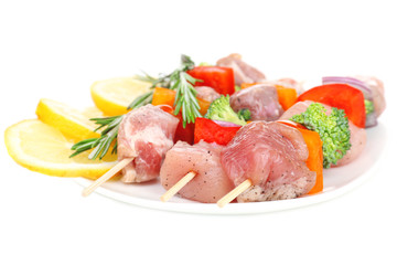 Raw pork kebab isolated on white