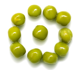 green peas on a white background. macro